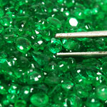 72.11-Carat Lot of Rare Velvet Green Round Sandawana Emeralds